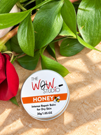 The WOW Studio Honey Intense Repair Balm styled with greenery and flower